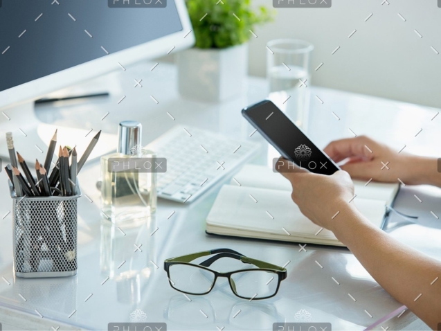 demo-attachment-399-close-up-of-female-hands-using-smart-phone-while-PWQR3QP